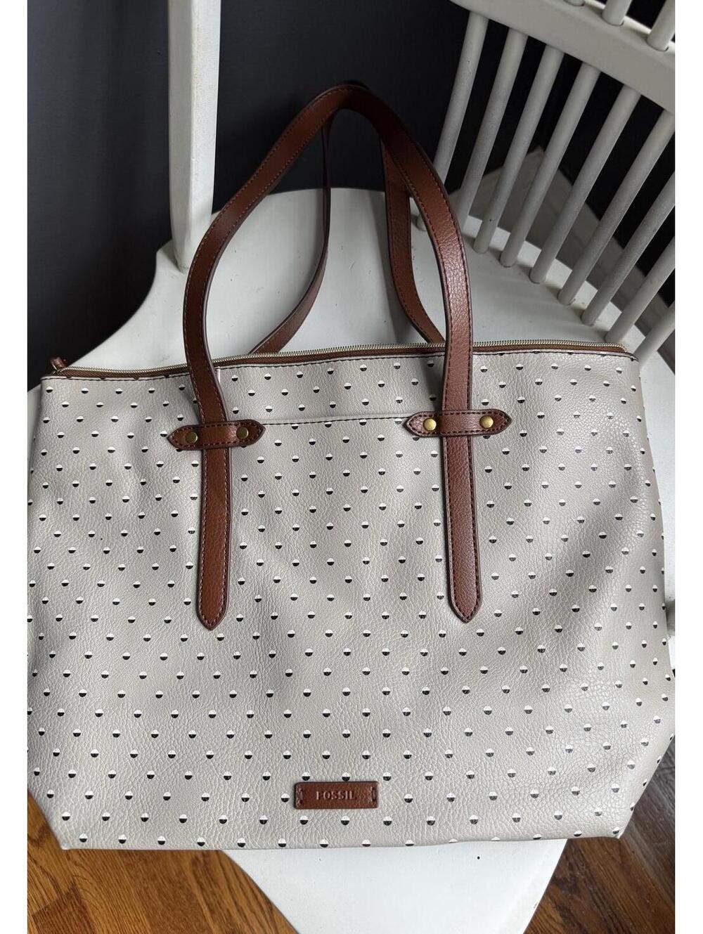 Fossil Cream Tote with Brown Leather Straps and Perforated Exterior